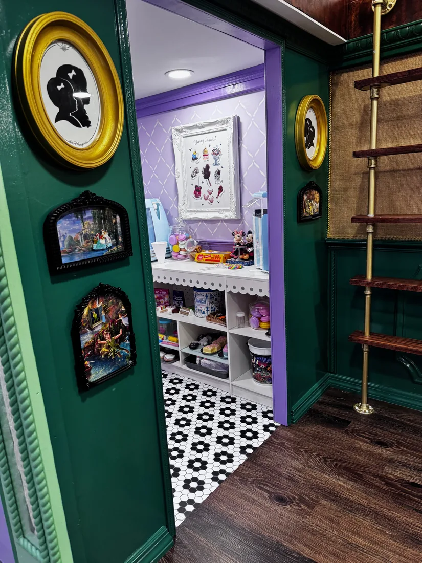 Looking through a doorway from the Clothier's into Miss Gracie's Sweet Shoppe next door
