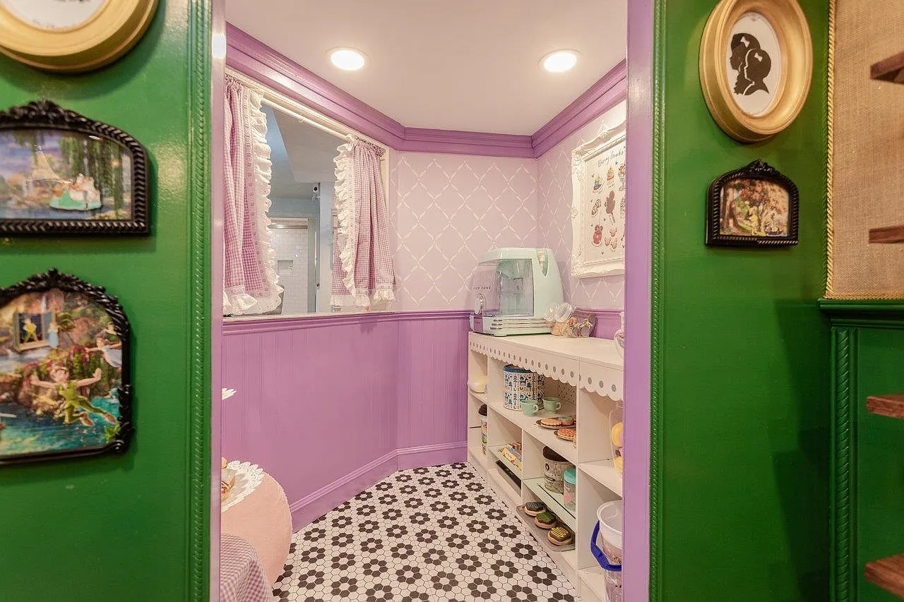 The Sweet Shoppe playhouse interior — purple wainscoting, diamond wallpaper, hex tile floor